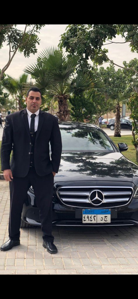 Golden Guard VIP bodyguard with luxury Mercedes-Benz — secure transportation Egypt